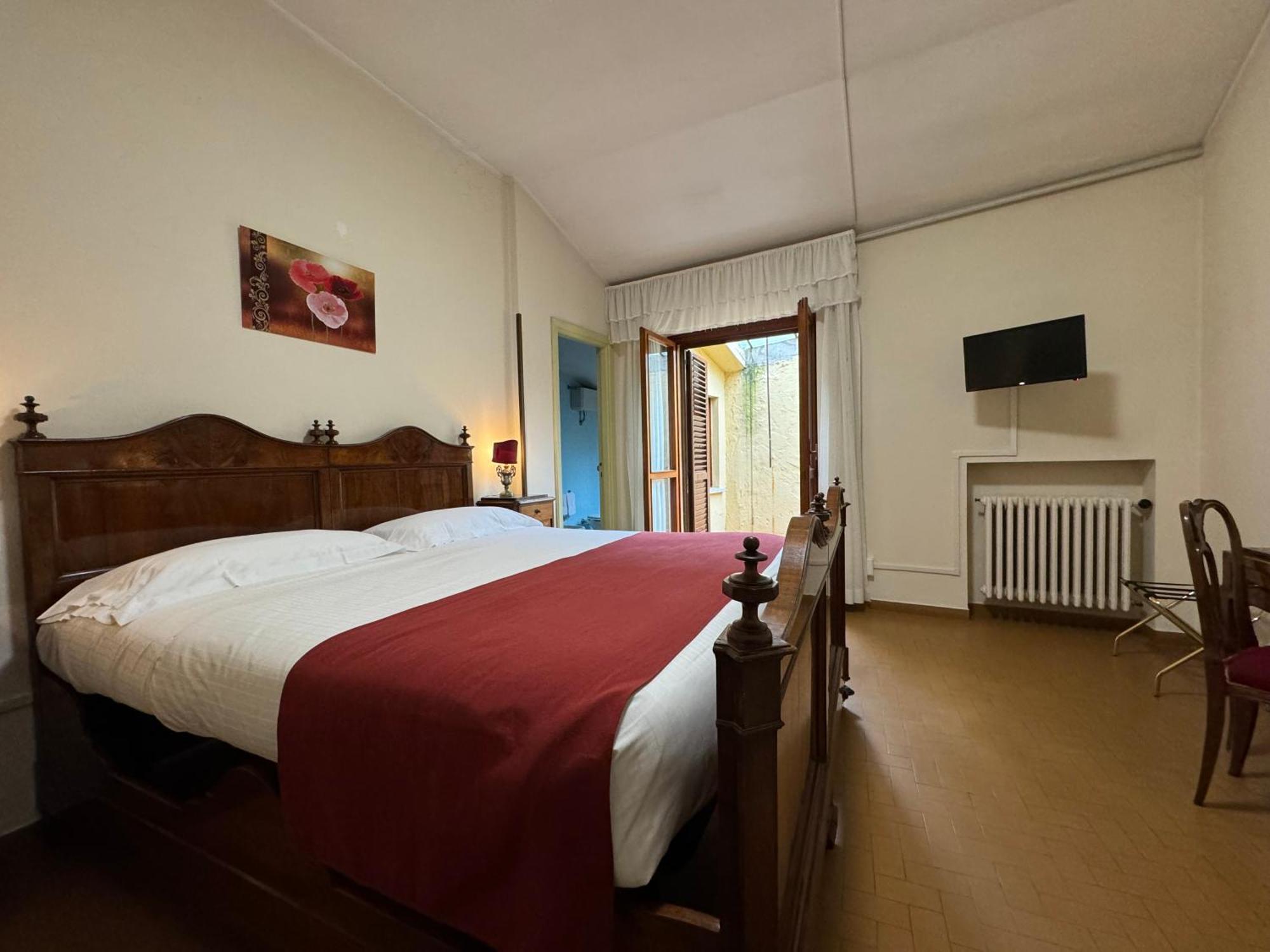 Hotel Monastero Ss. Annunziata Todi Exteriér fotografie A room at the hotel
