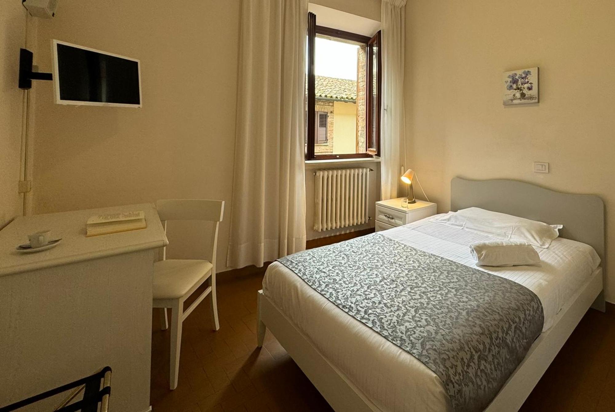 Hotel Monastero Ss. Annunziata Todi Exteriér fotografie A room at the hotel