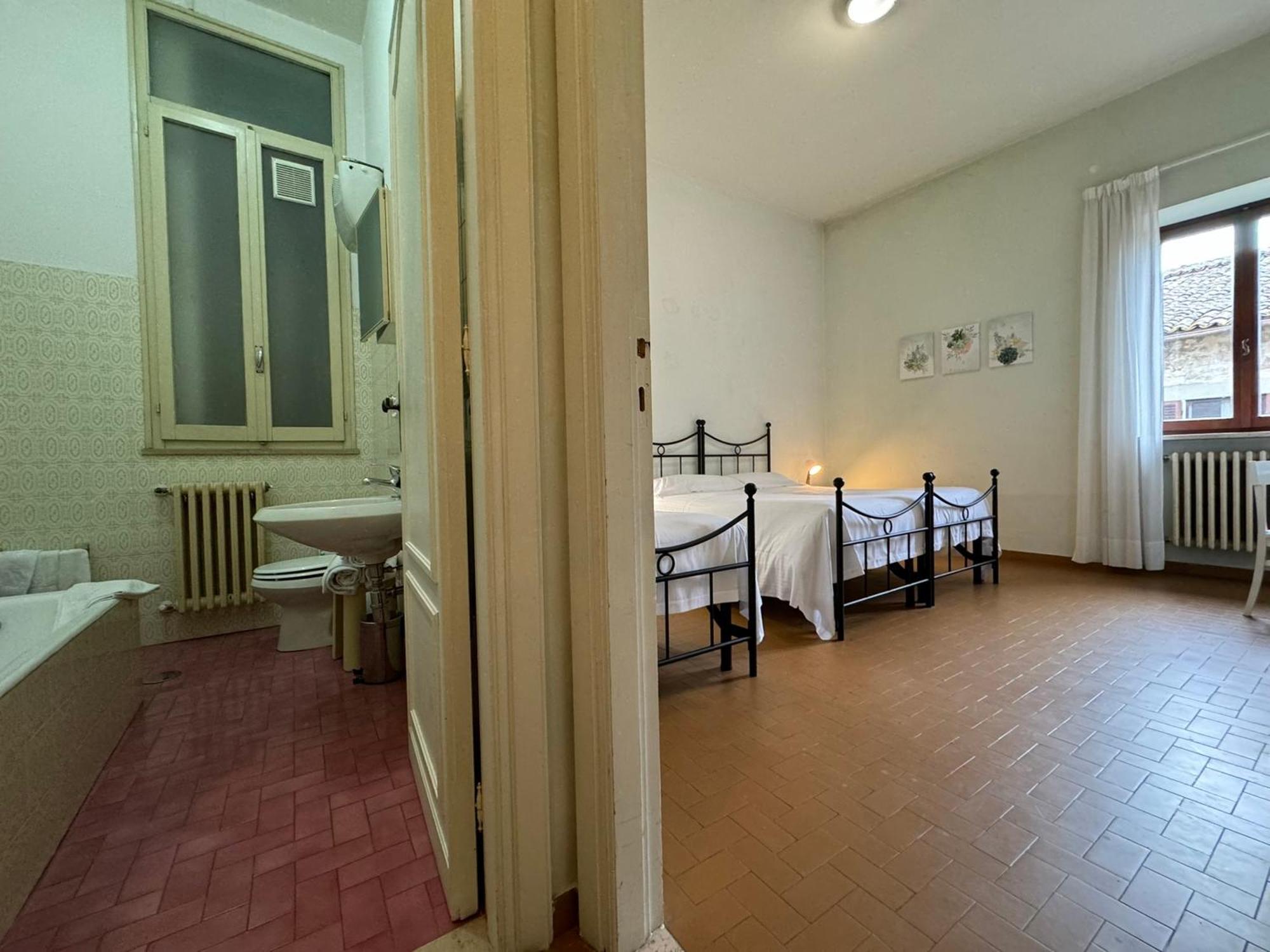 Hotel Monastero Ss. Annunziata Todi Pokoj fotografie A typical room at the San Pio X Seminary