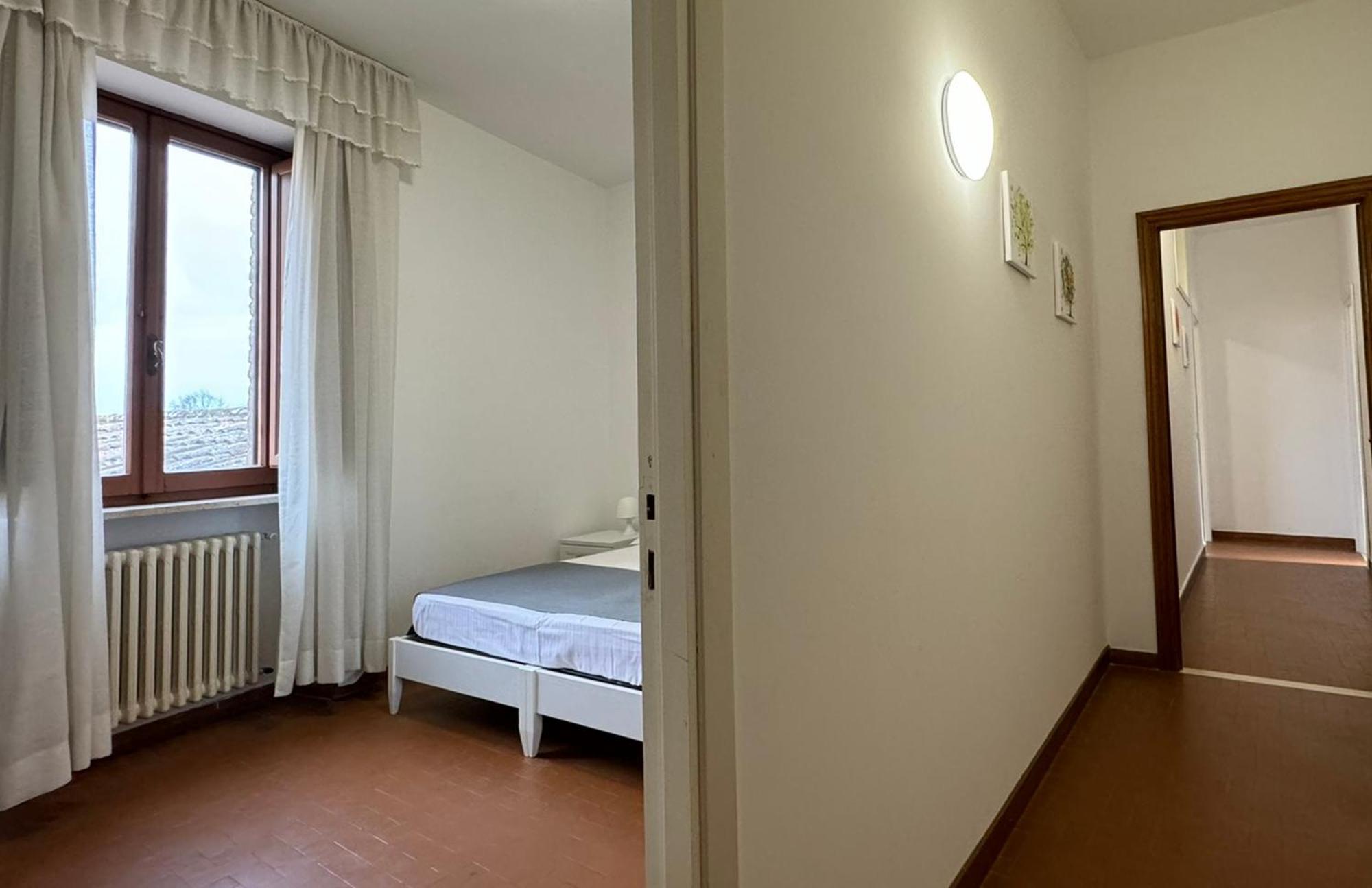 Hotel Monastero Ss. Annunziata Todi Exteriér fotografie A typical bedroom in the residence halls